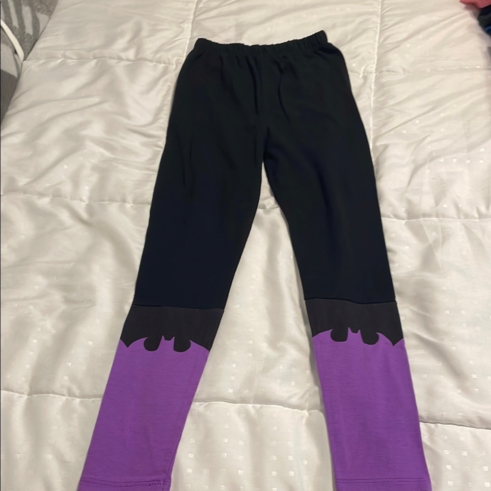 Vibrant Purple and Black Athletic Leggings with Bold Color-Block Design